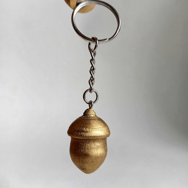 Porte clés gland doré
